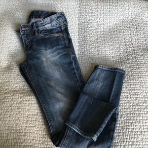Express distress washed skinny jeans